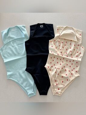 OQQ 3 Piece Ribbed Square Neck Bodysuit Pack - Cherry, Solid Black & Solid Blue
